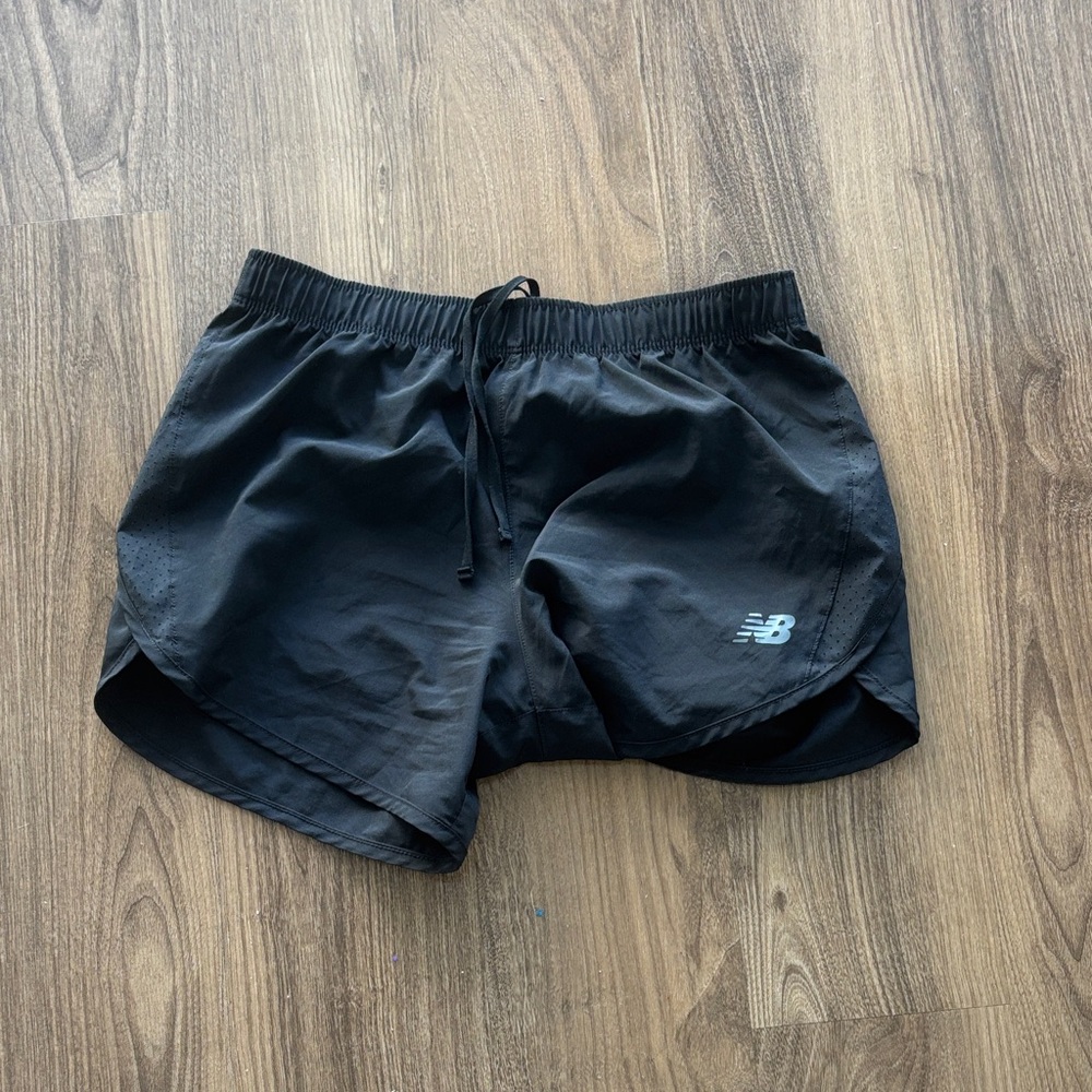 New balance, black shorts
